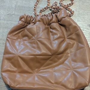 Quilted Drawstring Shoulder Bag in Tan